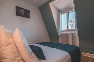 Appartements La Suite 7 Gite Urbain : photos des chambres