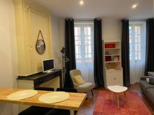 Appartements Charmant Studio centre-ville : photos des chambres