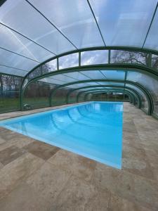 Maisons de vacances Belle Dependance du Chateau le Parc avec sa piscine : photos des chambres