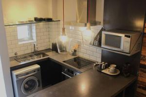 Well Appointed Apartment by ARPA Hospitalities