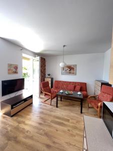 Apartament z garażem i ogrodem