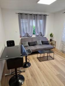 Appartements Maison avec exterieur et arrivee autonome - Aurillac : photos des chambres