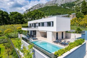 Luxury, seafront Villa IVAN with heated pool only 100m from beach