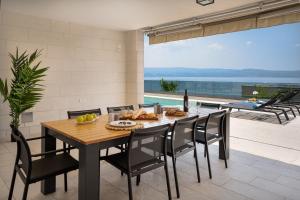 Luxury, seafront Villa IVAN with heated pool only 100m from beach