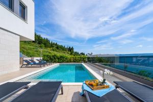 Luxury, seafront Villa IVAN with heated pool only 100m from beach