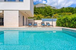 Luxury, seafront Villa IVAN with heated pool only 100m from beach