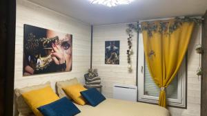 Appartements Un petit coin de Paradis : photos des chambres