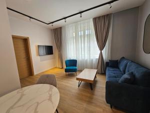 One-Bedroom Apartment room in City Nest Modern & Cozy Suites