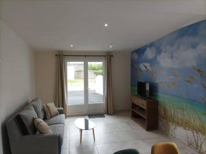 Appartements La Maisonnette aux volets bleus : photos des chambres
