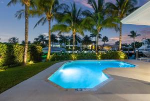 Seven Palms Waterfront- Private Dock, Heated Pool & Lanai -Walk to beach! by Maven Vacation Rentals