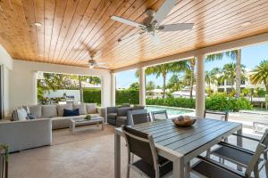 Seven Palms Waterfront- Private Dock, Heated Pool & Lanai -Walk to beach! by Maven Vacation Rentals