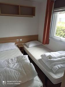 Campings MOBILHOME 3 CHBRES 2 SDE 2 WC LV LL TV CLIM TOUT CONFORT : photos des chambres