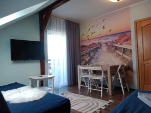 Apartamenty i Domki Osińscy