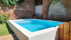 Appartements Le Jardin Secret - Piscine - Clim - Haut de gamme : photos des chambres