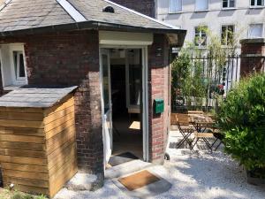 Appartements La cabane urbaine et son jardin : photos des chambres