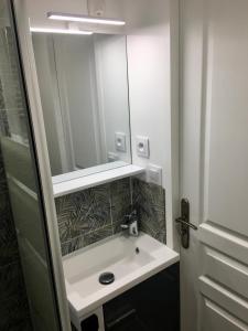 Appartements La cabane urbaine et son jardin : photos des chambres