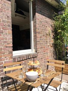 Appartements La cabane urbaine et son jardin : photos des chambres