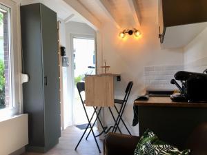 Appartements La cabane urbaine et son jardin : photos des chambres