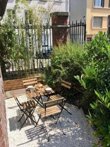 Appartements La cabane urbaine et son jardin : photos des chambres