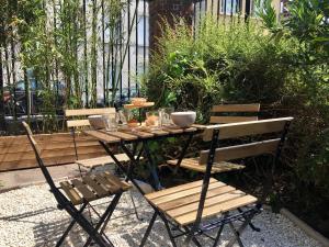 Appartements La cabane urbaine et son jardin : photos des chambres
