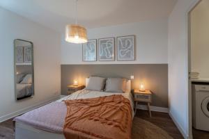 Appartements L'Evasion - Au coeur de Dax : photos des chambres