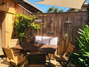 Maisons de vacances Cocon entre presqu'ile du Cap Ferret et plages oceanes - terrasse - 1 velo gratuit : photos des chambres