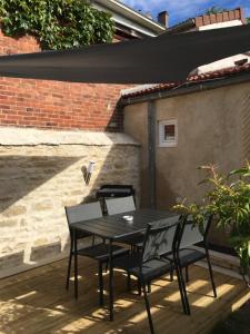 Petite maisonnette cosy et pleine de charme située à proximité du centre-ville