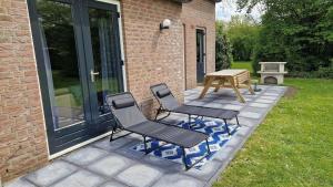 Gezellig 6pers Familiehuis grote tuin met BBQ aan meer Gelderland