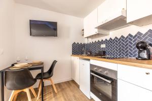 Appartements Le Cocon Thiernois : photos des chambres