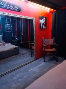 Appartements LOVE ROOM Le rouge et noir : photos des chambres