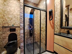 Appart'hotels Ospaloft, meuble haut de gamme avec spa privatif : photos des chambres