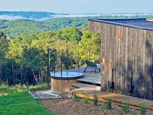 Lodges Hameau Du Sentier Des Sources : photos des chambres