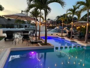 Hermosa mansión en Puerto Aventuras con alberca - 4 tähden hotellit kaupungissa Puerto Aventuras
