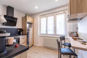 Appartements T3 avec Terrasse & Jardin Proche de la gare : photos des chambres