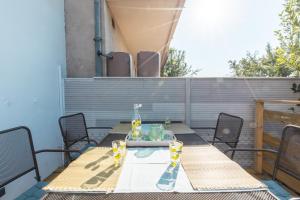 Appartements T3 avec Terrasse & Jardin Proche de la gare : photos des chambres