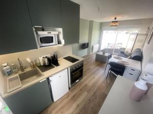Appartements Studio avec jardin, au calme : photos des chambres