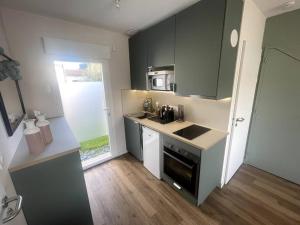 Appartements Studio avec jardin, au calme : photos des chambres