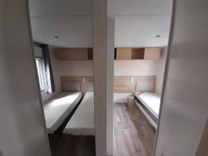Campings Kokua Developpement presente Mobil Home spacieux 3CH 2 SDB Valras Plage : photos des chambres