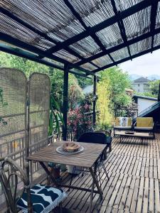 Appartements La Cabane Urbaine et sa terrasse : photos des chambres