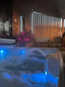 Chalets Chalet avec spa, Au Bois Quartois : photos des chambres