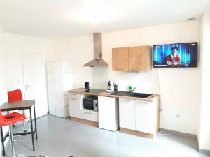 Appartements studio hyper-centre confortable acces boite a clee : photos des chambres