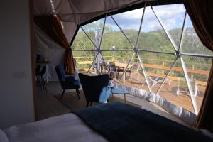 Maisons de vacances Nuit insolite en amoureux Bulle Dome : photos des chambres