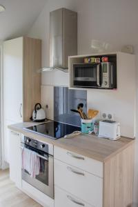 Maisons de vacances La Maison Bleue avec Jardin a Mers-Les-Bains : photos des chambres