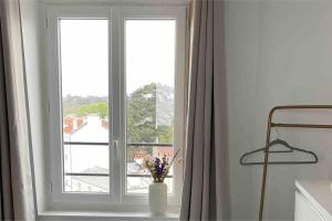 Appartements Le Cosy Perche Montmorency, 4eme etage sans ascenseur : photos des chambres