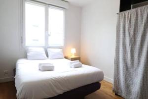 Appartements T3 confort - proche du port : photos des chambres