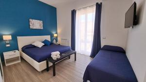 Chambre Triple avec Balcon
