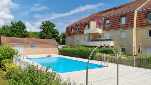 Appartements Appartement avec piscine - Beaune like Home : photos des chambres