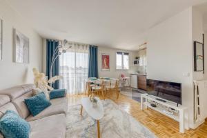 Appartements Blue Dream - RER B&C - Netflix / Disney+/ Easy Check-in : photos des chambres