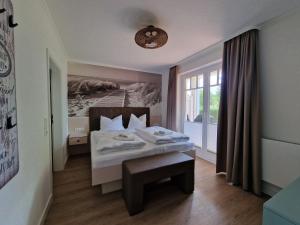Dünenpark Binz - Komfortplus Ferienwohnung mit 1 Schlafzimmer und Terrasse im Erdgeschoss 050