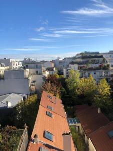 Sejours chez l'habitant Appartement tres calme a 10mn de Paris - woman & couples only : photos des chambres